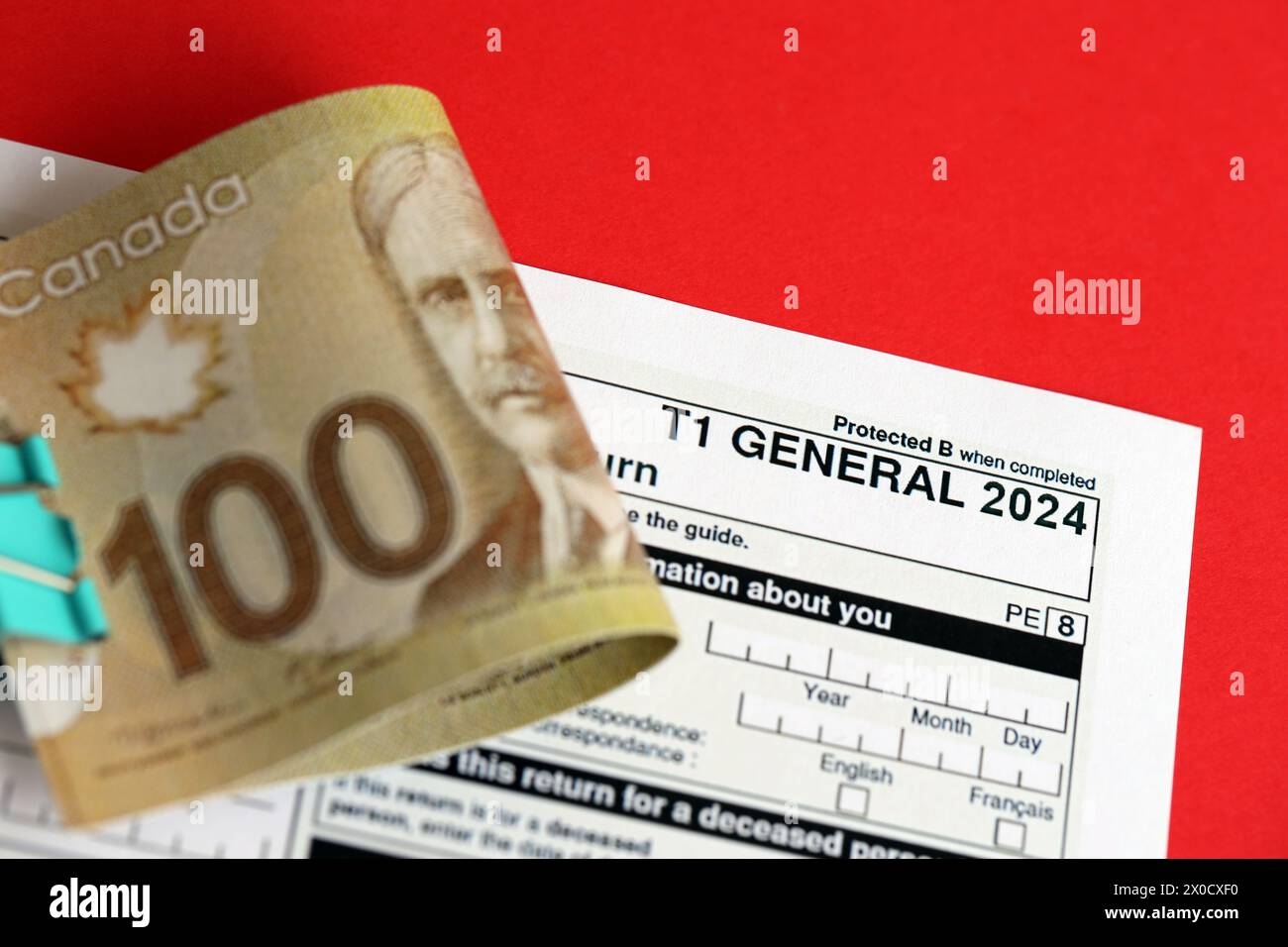 Canadian T1 General Tax Form Income Tax And Benefit Return Lies On Table With Canadian Money Bills Close Up Taxation And Annual Accountant Paperwork In Canada Stock Photo Alamy